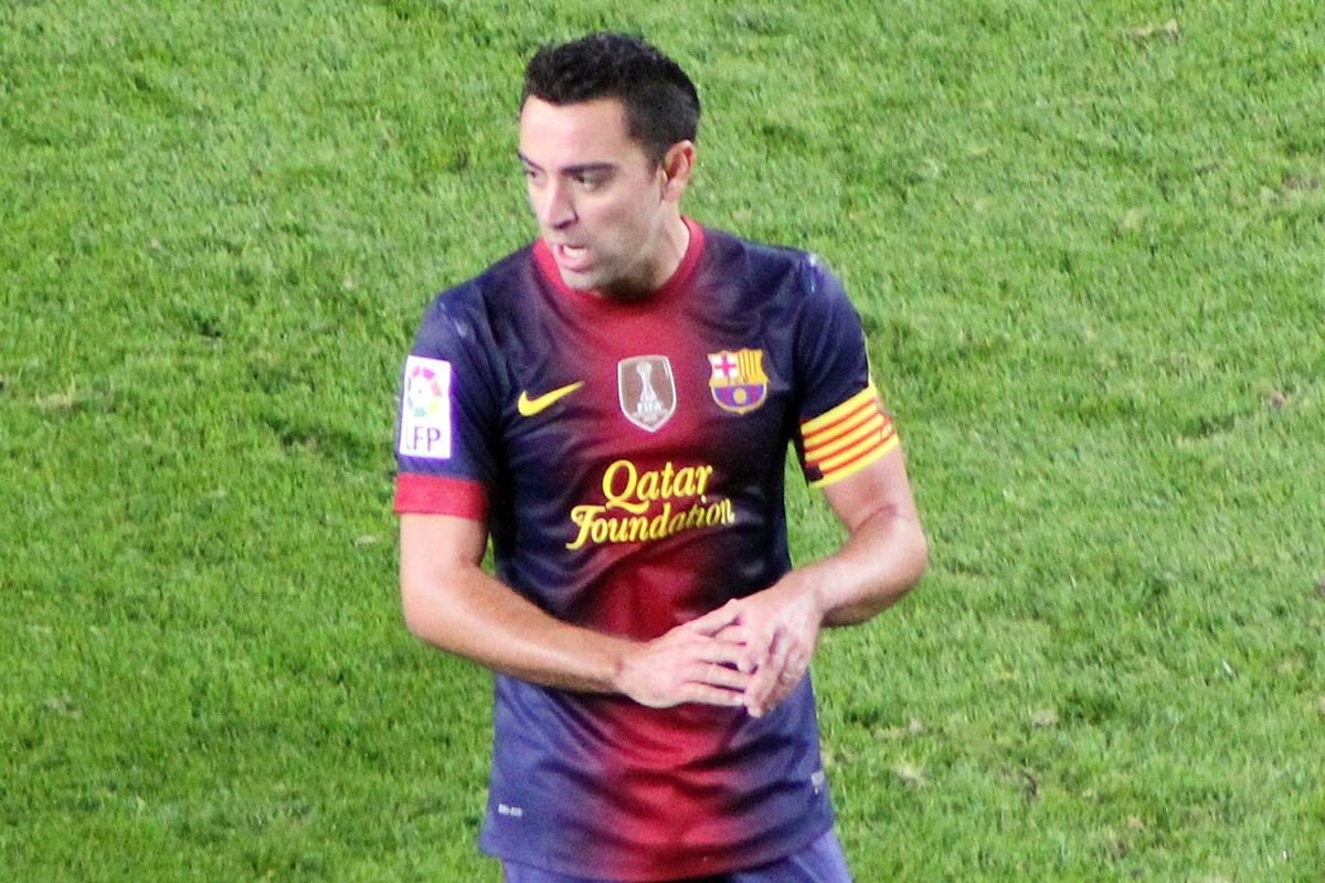 Xavi Hernández in the Barcelona shirt, wearing the captain's armband, during a La Liga match in November 2012